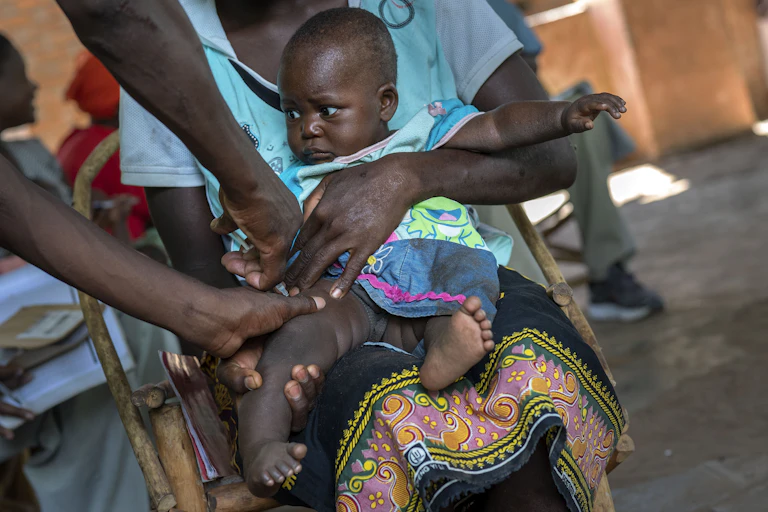 Child being vaccinated in Africa