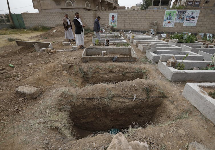Freshly dug graves in a Houthi war cemetery in Sana'a, Yemen, September 2021.