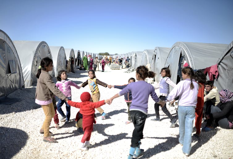 Syrian refuge children playing in refugee camp in Turkey