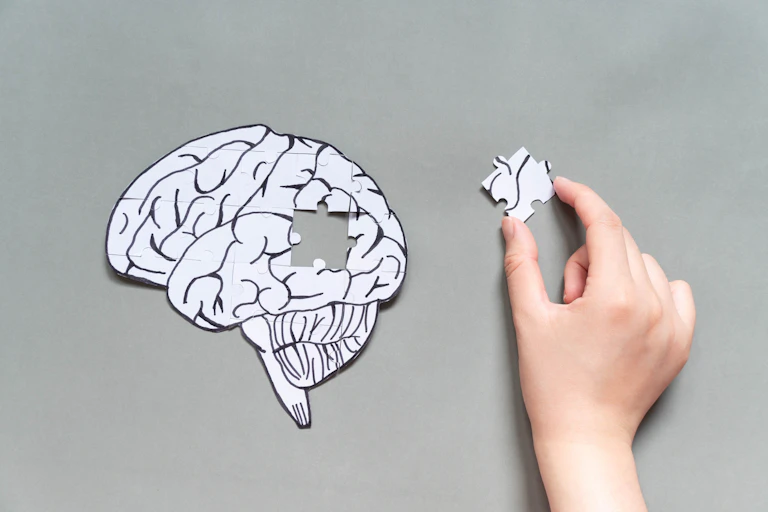 Brain puzzle with a piece missing