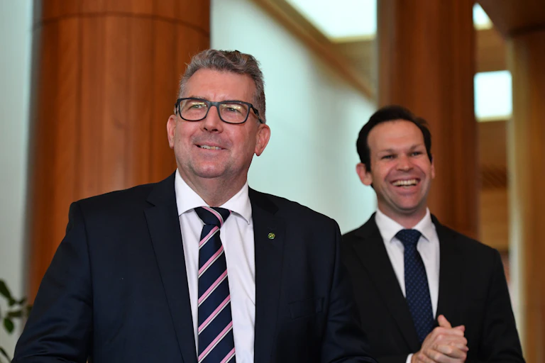 two men smiling