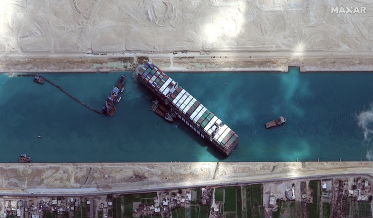 A ship blocks the Suez Canal.
