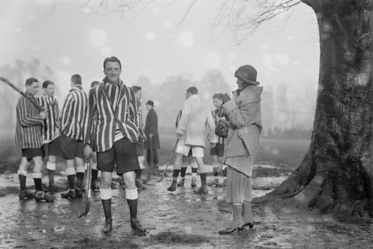 A caricaturist for The Bystander captures the captain of the Oxford men's hockey team during a match in Kent, in 1923