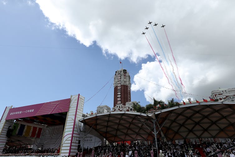Taiwanese military jets fly over as part of the National Day celebrations in Taipei, Taiwan, 10 October 2021.