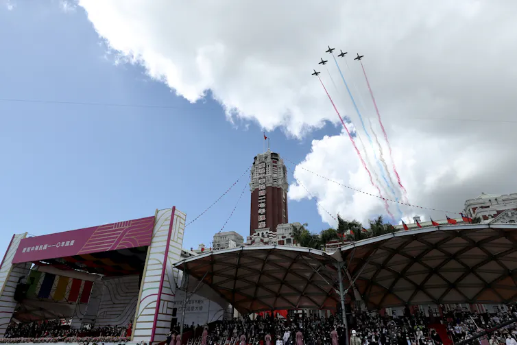 Taiwanese military jets fly over as part of the National Day celebrations in Taipei, Taiwan, 10 October 2021.