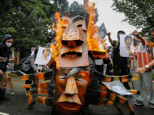 Protesters burn effigies of Duterte and Marcos Jr.