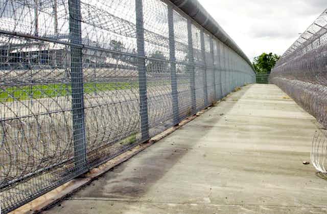 Maximum security prison perimeter fence