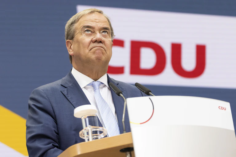 CDU election candidate Armin Laschet looks grim faced during a post-result press conference.