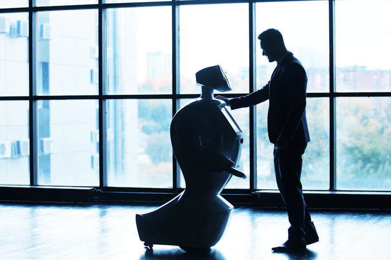 A man interacting with a robot