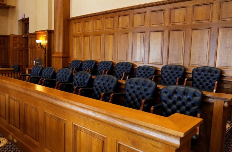 Empty seats in a jury box