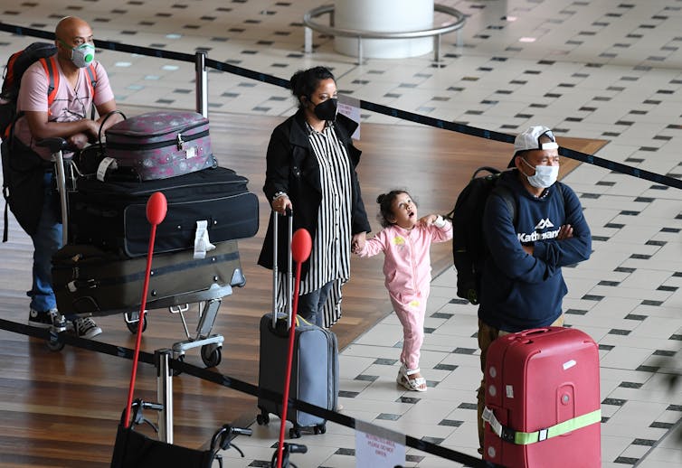 Passengers arrive in Brisbane in April 2020.