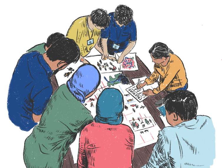 An illustration of people working at a table