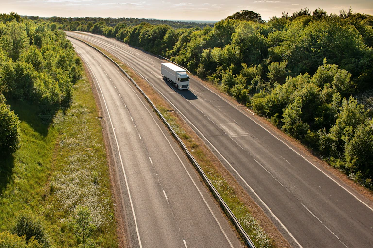 Solitary HGV on empty UK road.