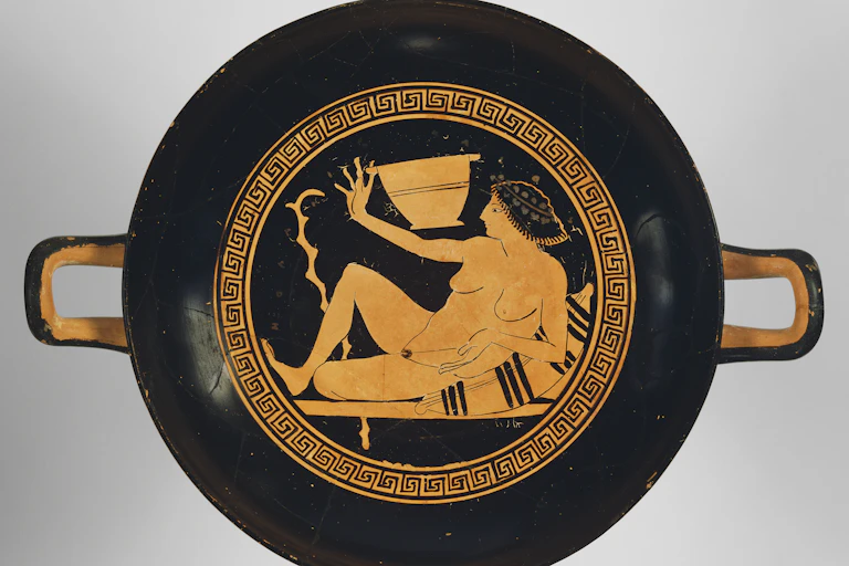 A naked woman on Ancient Greek pottery