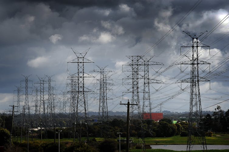 Powerlines against a dark sky