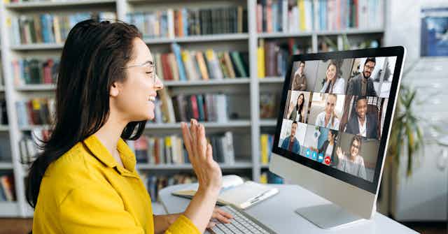 A student sitting at a videoconference.