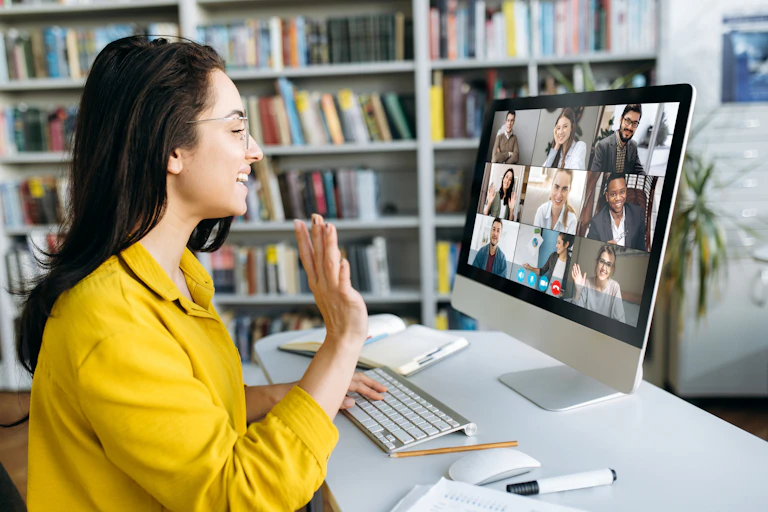 A student sitting at a videoconference.