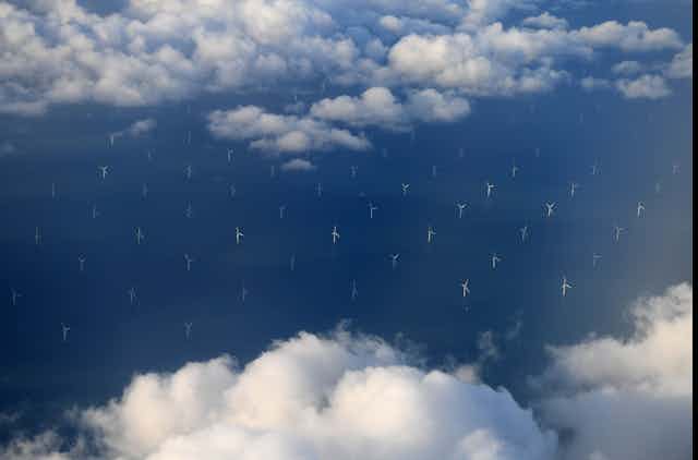 Rows of turbines in the ocean