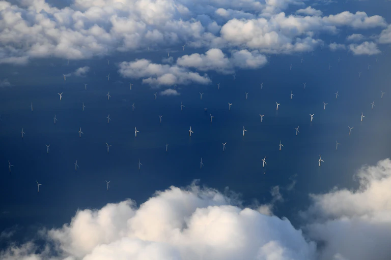 Rows of turbines in the ocean
