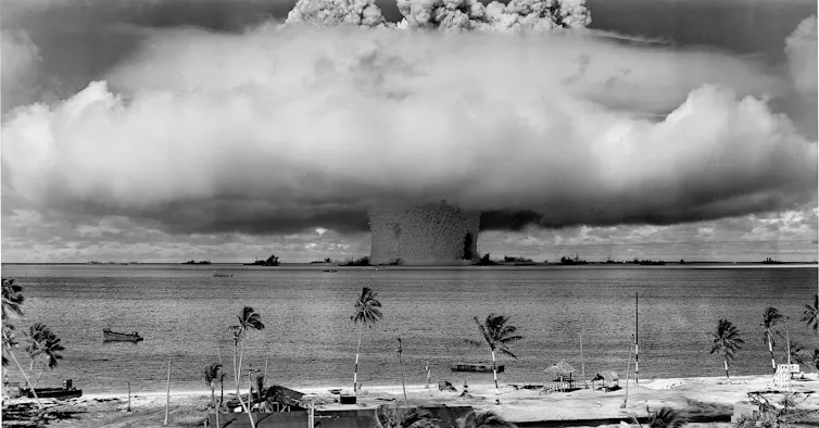 A nuclear explosion above a tropical sea