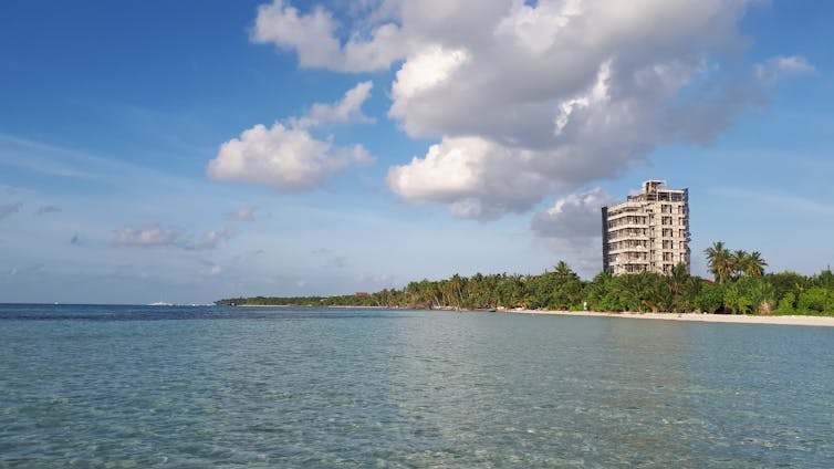 A hotel under construction on an island
