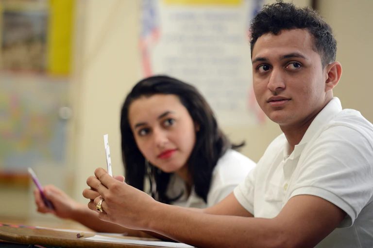 A student sits in a seat during class.