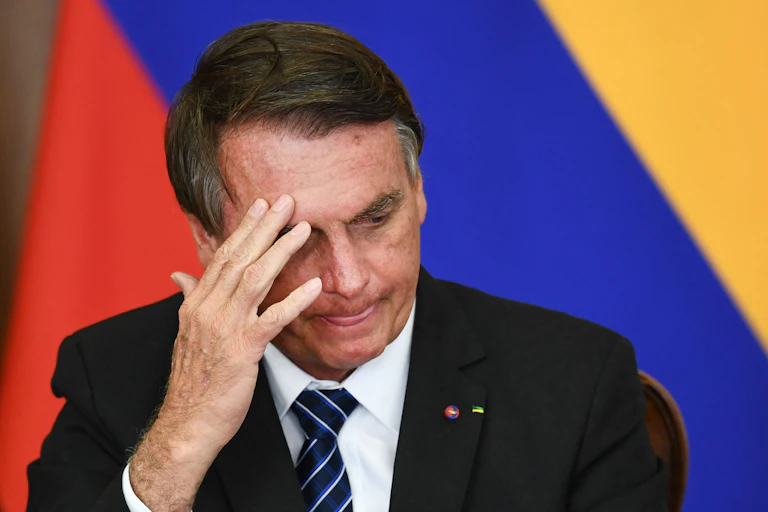 Brazilian President Jair Bolsonaro gestures with his hands.