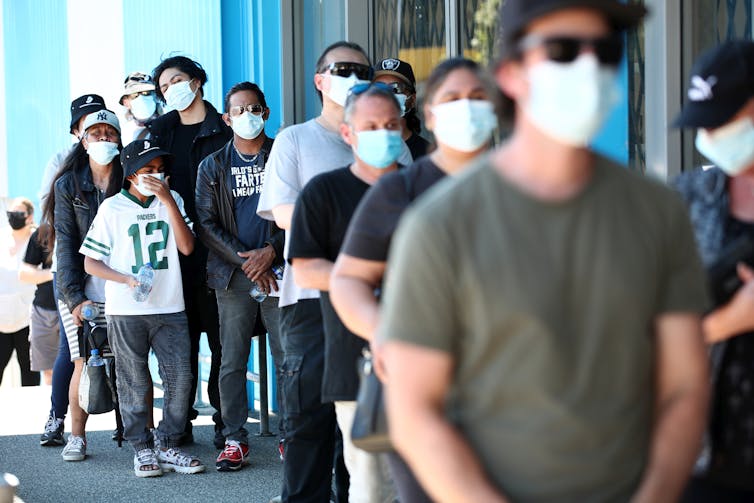 Queue of people waiting to be vaccinated.