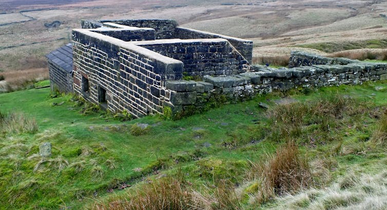 A farmhouse ruin on an English moor.