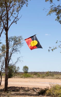 An Aboriginal flag flown in protest against mining at the Adani Bravus Carmichael mine site in the Galilee Basin, Central Queensland.