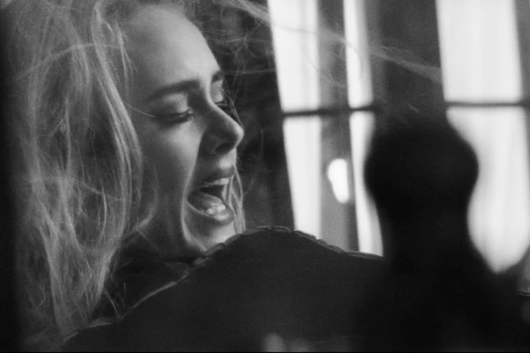 Adele singing.