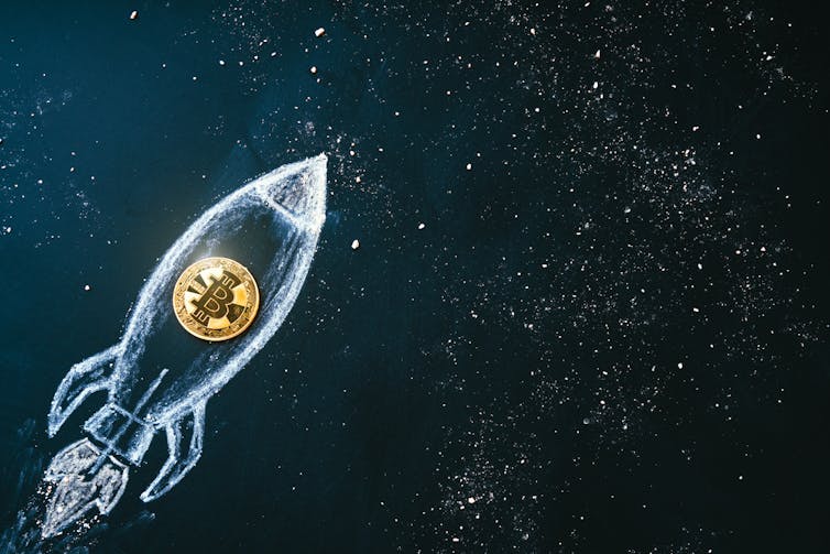 Illustration of bitcoin suspended inside a rocket in space.