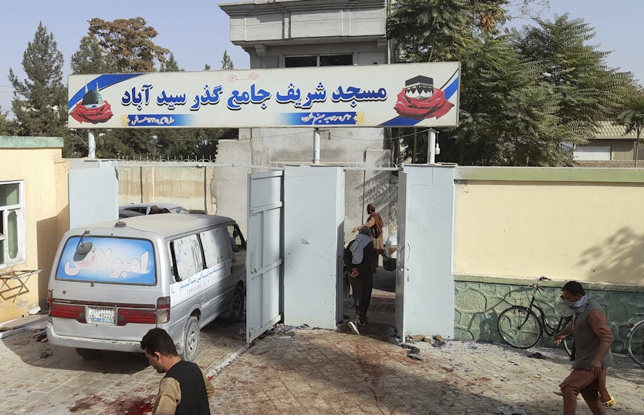 An ambulance entering a mosque in northern Afghanistan.