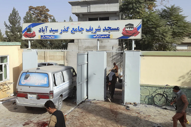 An ambulance entering a mosque in northern Afghanistan.
