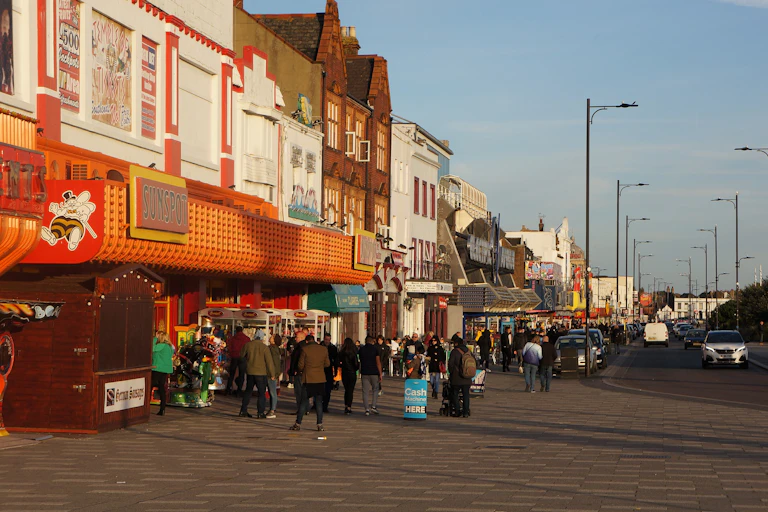 People walk along the seafront of Southend-on-Sea