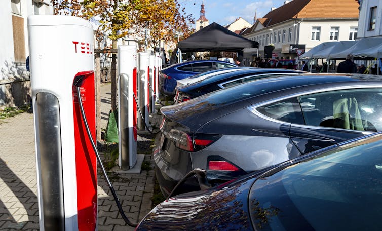 cars parked at charging stations