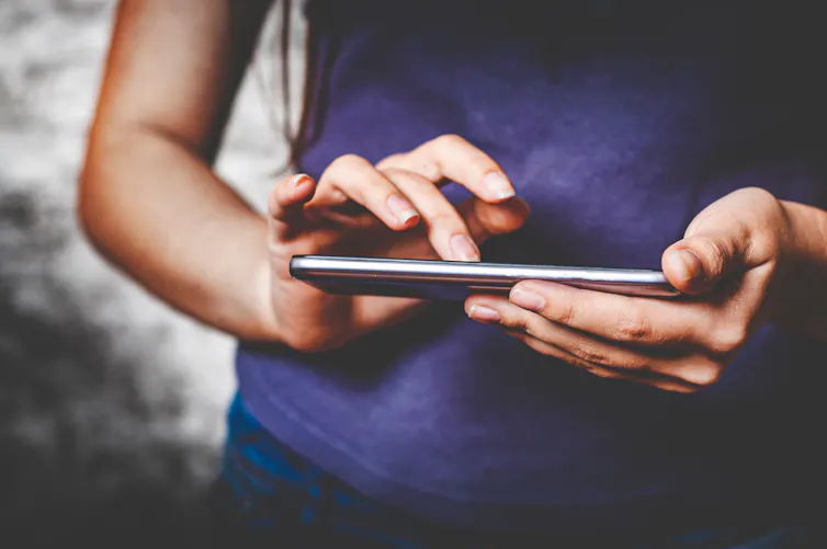 A person using a smartphone.