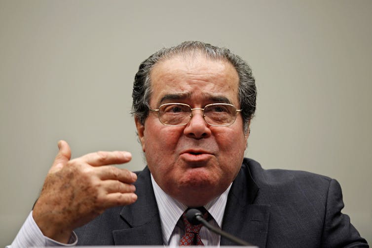 A head-and-shoulders photo of the late Supreme Court Justice Antonin Scalia.