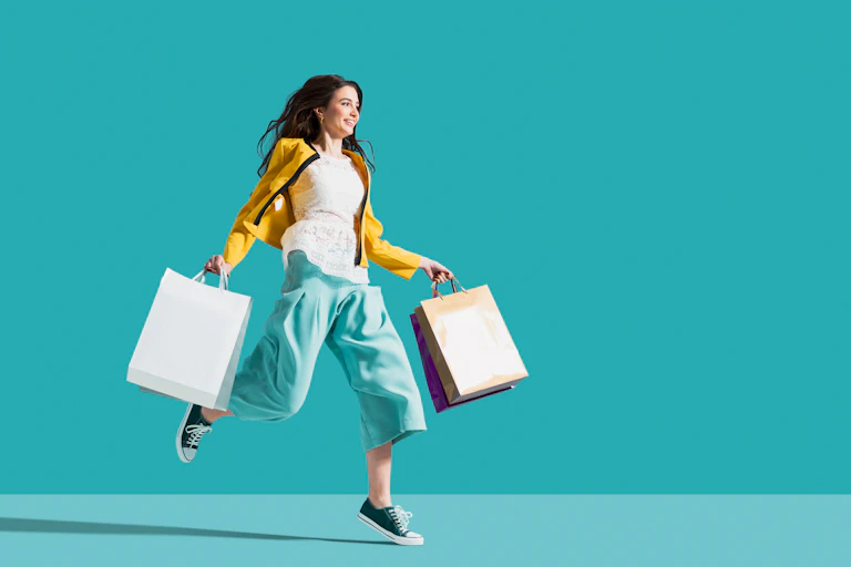 Young woman with shopping bags