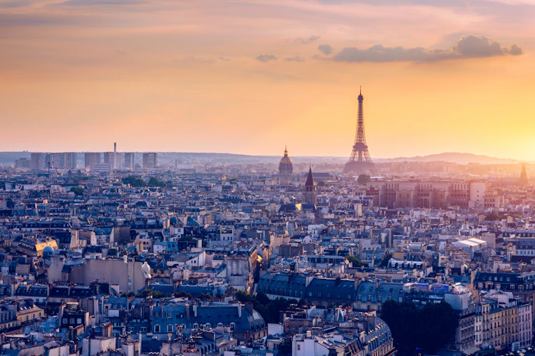 A panorama of the boulevards of Paris including the Eiffel Tower.