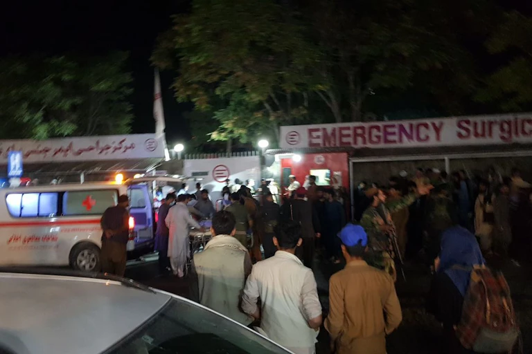 Emergency vehicles respond the scene of the attack