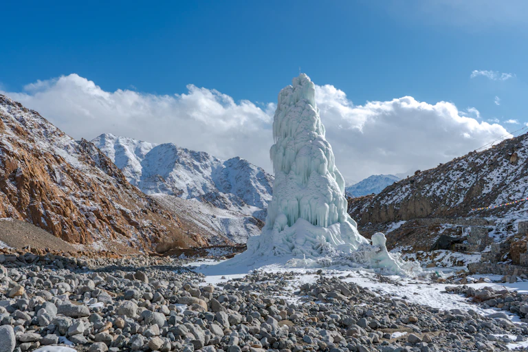 An ice stupa - an artificially created mini glacier - in the mountains of the Lahakh region.