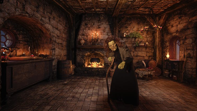 Old hag witch standing in her cottage with cauldron boiling on an open fire.