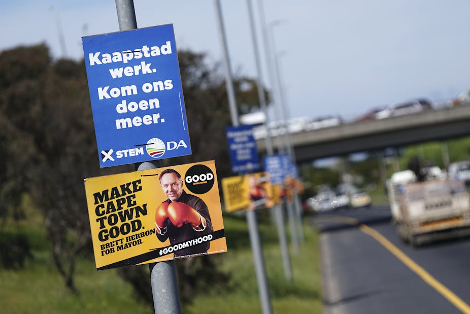An election poster shows a man campagning to be the new mayor of Cape Town wearing boxing gloves