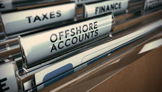 Files labelled taxes, offshore accounts and finance.