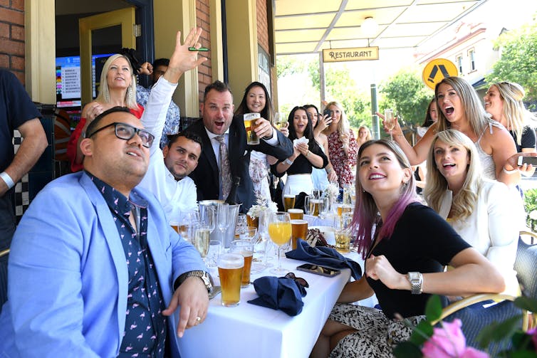 Pub goers watch the Melbourne Cup in 2020.