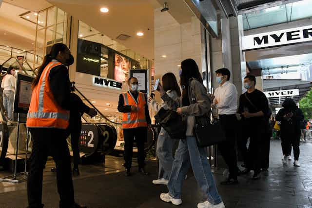 Shoppers entering a Myer store in Sydney