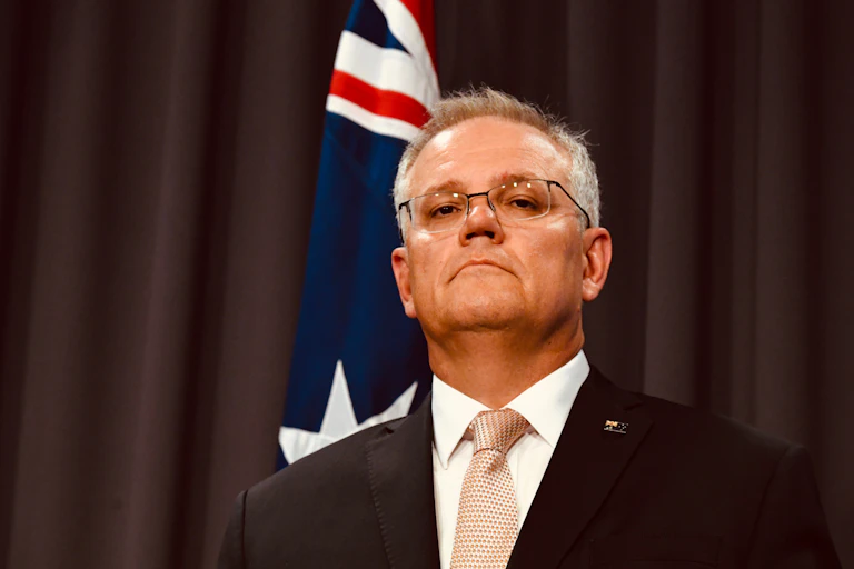 Scott Morrison in front of Australian flag