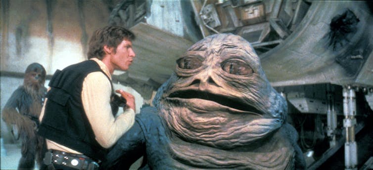 Harrison Ford and Jabba the Hutt in Star Wars: A New Hope