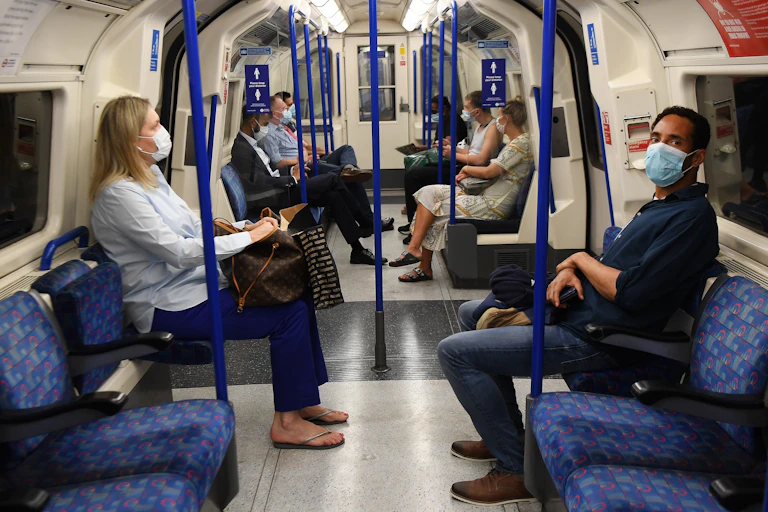 People wearing masks on the London Underground